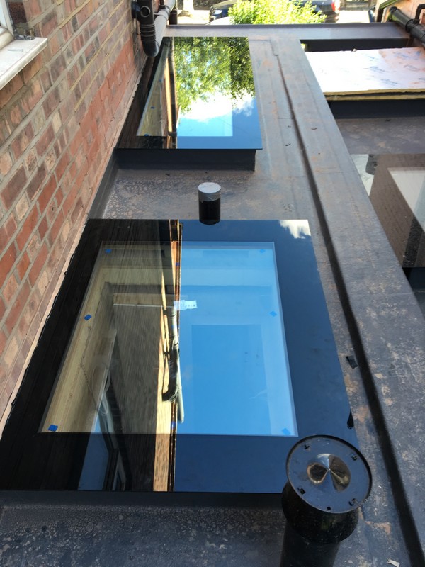 Multiple flat roof skylights on extension in Borehamwood